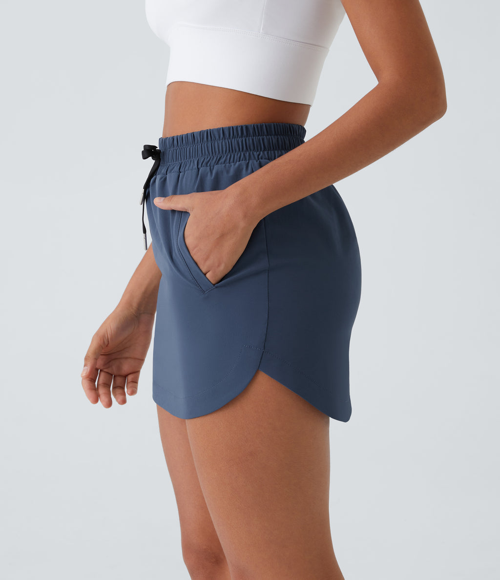 High Waisted Drawstring Pocket 2-in-1 Curved Hem Mini Golf Skirt — Oceana — view 4