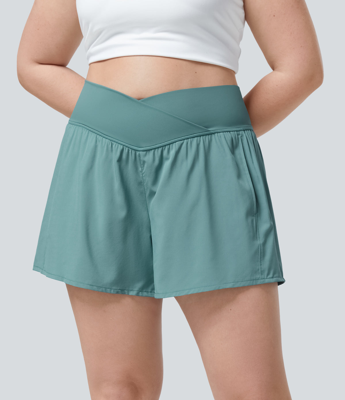 High Waisted Crossover Side Pocket Plus Size 2-in-1 Quick Dry Yoga Shorts 4.5" — Mineral Blue — view 1
