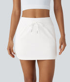 QuickDry High Waisted Drawstring Side Pocket 2-in-1 Curved Hem Mini Golf Skirt-Golf Tee Pocket — White — view 3