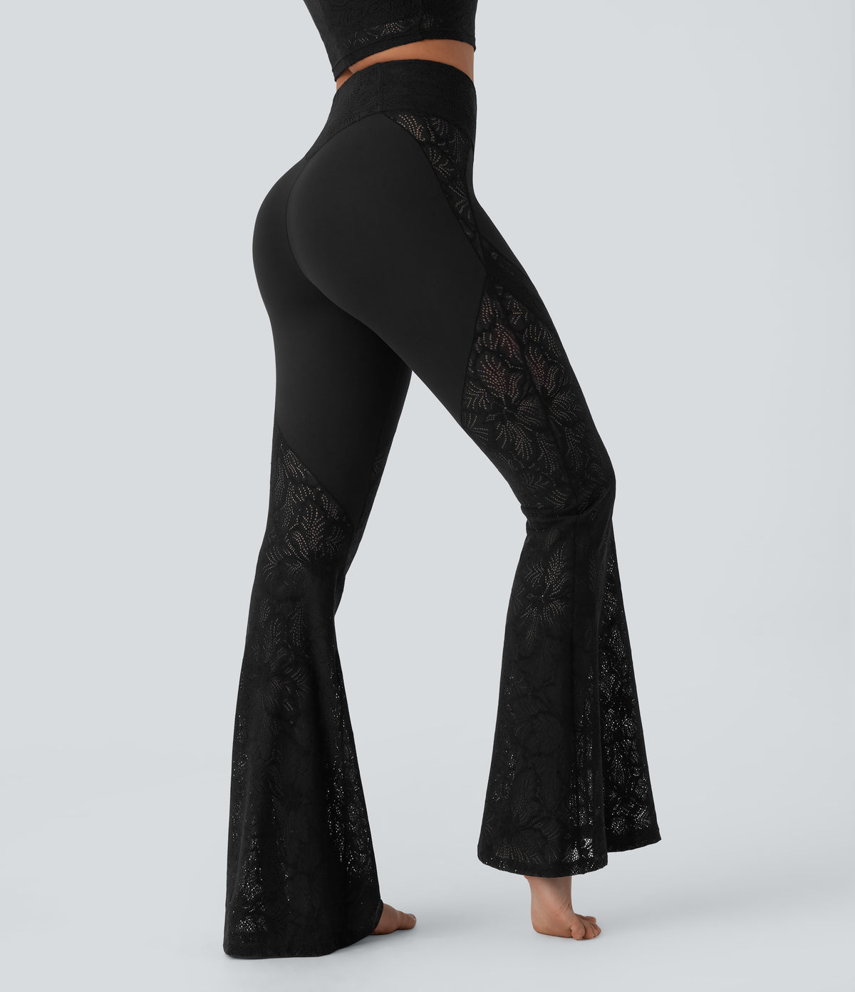 High Waisted Crossover Back Pocket Contrast Lace Flared Yoga Leggings — Black — view 4