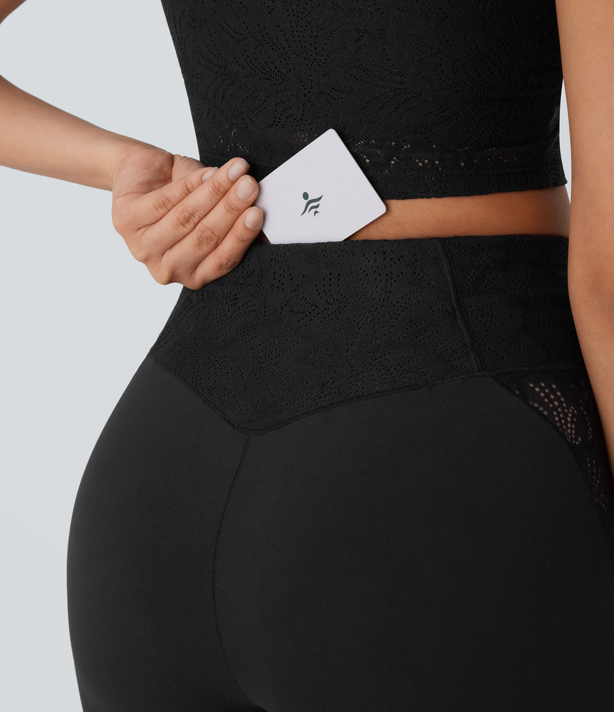 High Waisted Crossover Back Pocket Contrast Lace Flared Yoga Leggings — Black — view 5