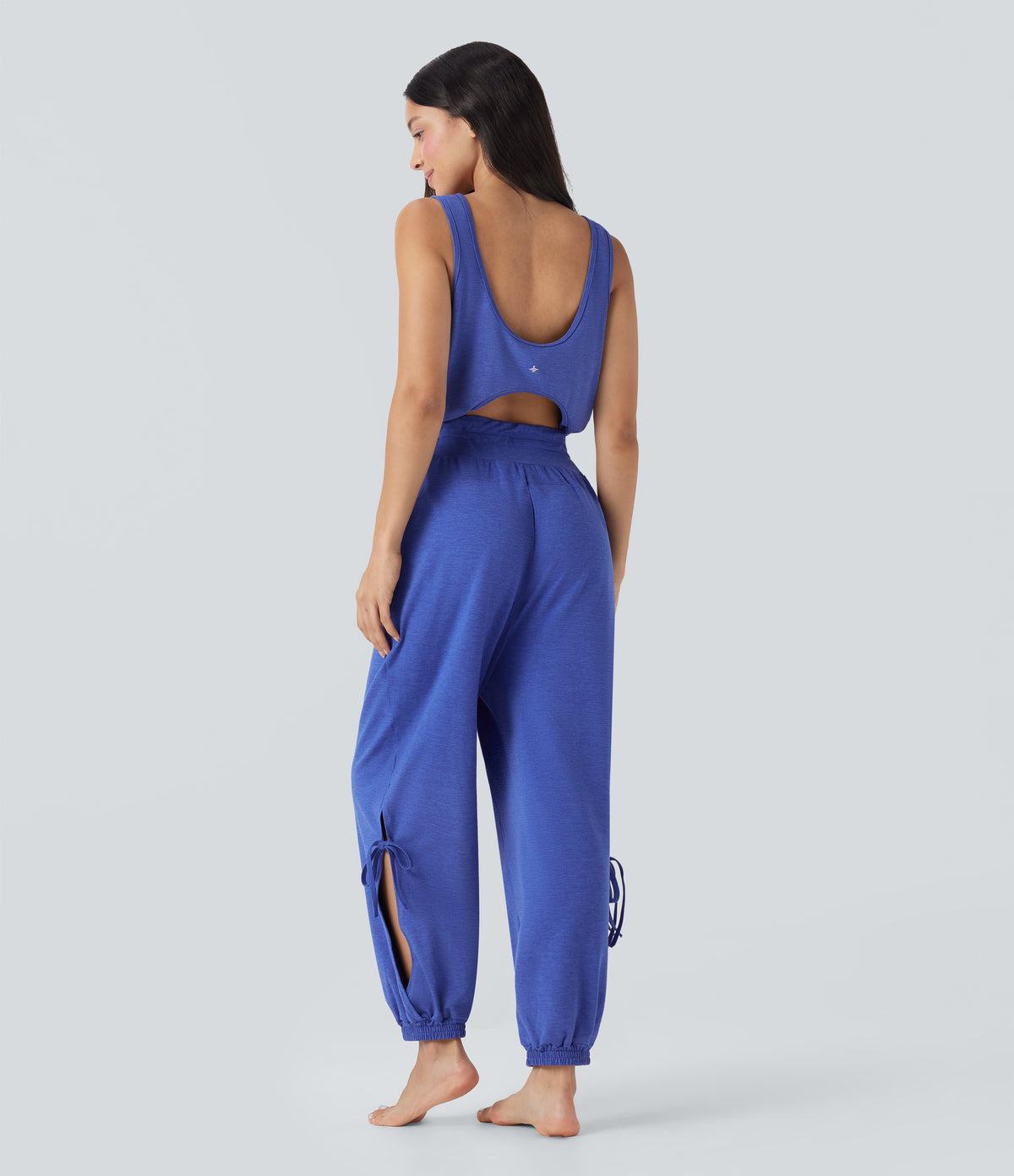 Sleeveless Backless Cut Out Drawstring Yoga Jumpsuit with Pockets — Mottled Glass Blue — view 1