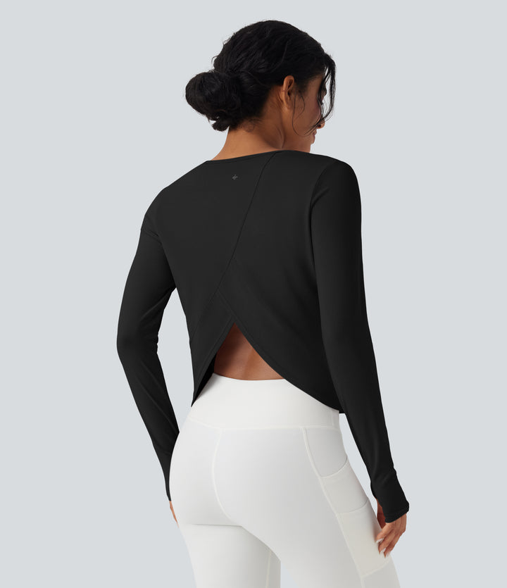 Long Sleeve Thumb Hole Crossover Curved Hem Yoga Sports Top — Black — view 1