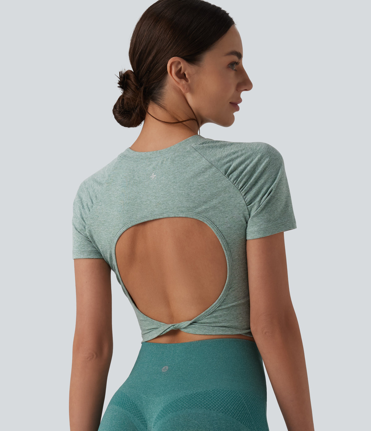 Round Neck Short Sleeve Cut Out Cropped Workout Sports Top — Jade Static — view 1