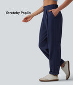 Mid Rise Pleated Rolled Hem 7/8 Stretchy Poplin Casual Tapered Trousers with Pockets — Peacoat — view 1