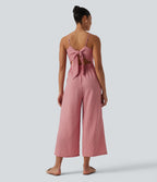 Tie Back Cut Out Stripe Linen-Feel Slip Jumpsuit with Pockets — Candy Pink Black Yarn Dye Stripes — view 1
