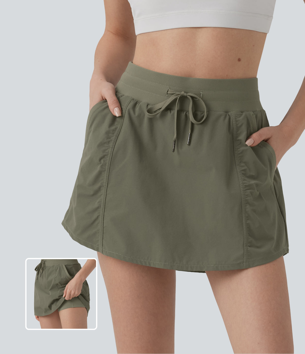 High Waisted Drawstring Mini 2-in-1 Workout A-line Skirt with Pockets — Dusty Olive — view 1