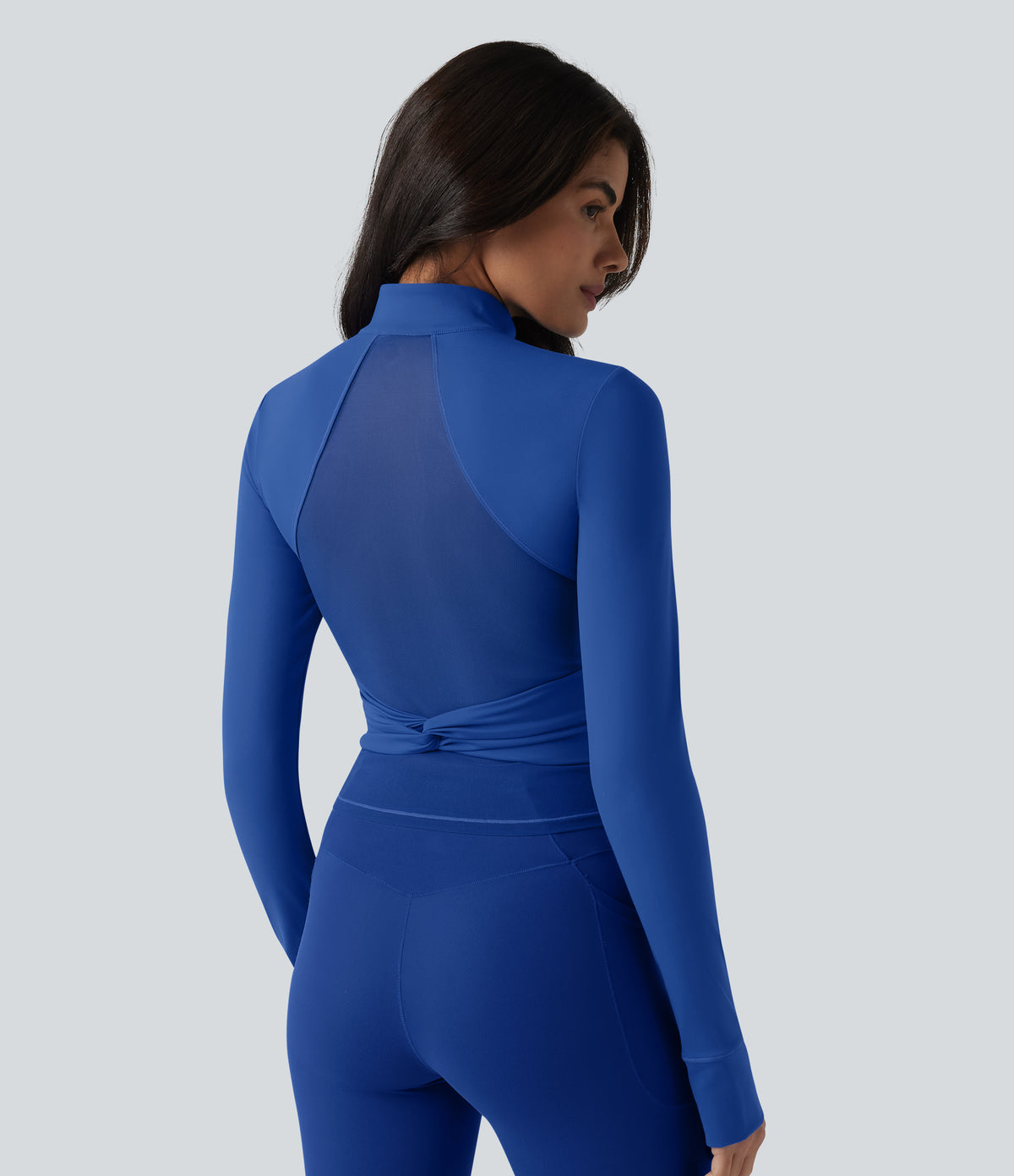 Plush Stand Collar Long Sleeve Thumb Holes Twisted Back Breathable Mesh Yoga Jacket with Pockets — Beaucoup Blue — view 5