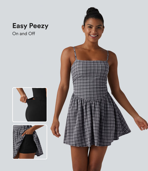 Adjustable Straps 2-in-1 Built-in Bra A-line Mini Plaid Crinkle Quick Dry Tennis Active Slip Dress with Pockets — Ink-Snow Weave Plaid — view 1
