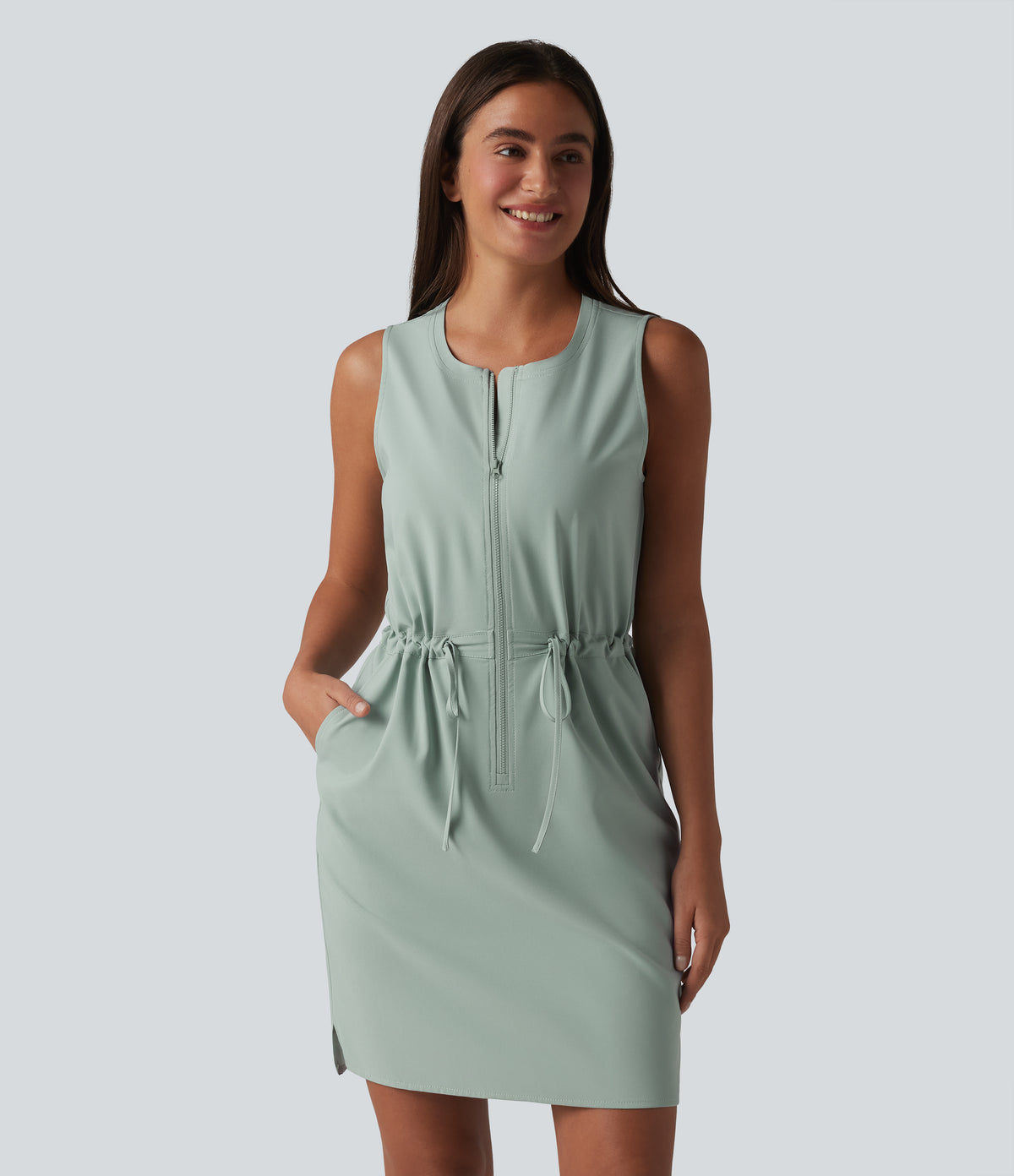 Round Neck Sleeveless Half Zip Drawstring Mini Hiking Active Dress with Pockets — Jadeite — view 1