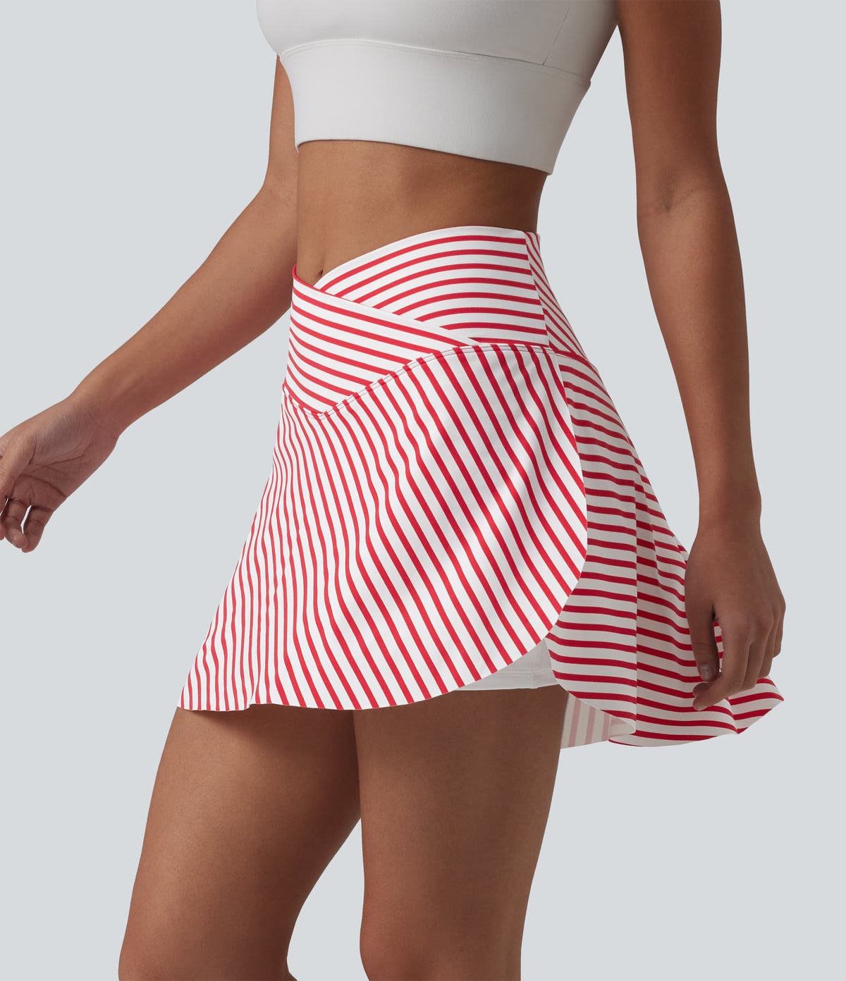 Crossover High Waisted Curved Hem 2-in-1 Stripes Mini Tennis Skirt with Pockets — Candy Stripe Whirl — view 4
