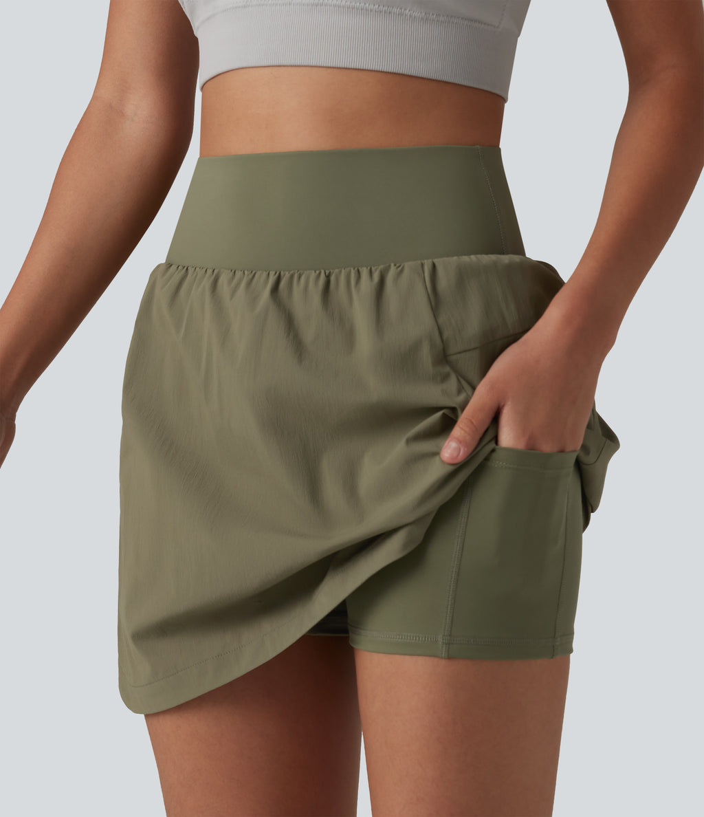 High Waisted Curved Hem 2-in-1 Mini Hiking Skirt with Pockets — Dusky Green — view 1
