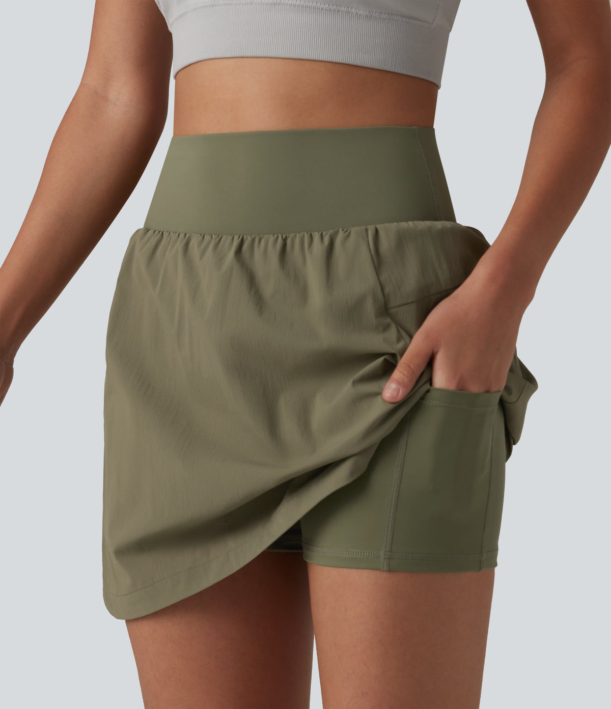 High Waisted Curved Hem 2-in-1 Mini Hiking Skirt with Pockets — Dusky Green — view 1
