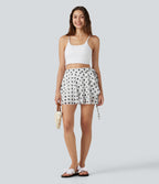 High Waisted Tie Side 2-in-1 Flowy Polka Dot Mesh Micro Mini Flare Skirt with Pocket — Classic Noir Dot — view 7