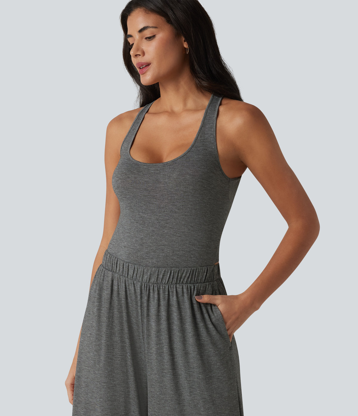 Crisscross Backless U-Neck Sleeveless Ruffle Hem Flowy Casual Jumpsuit with Pockets — Darl Gray Floral Yarn — view 6