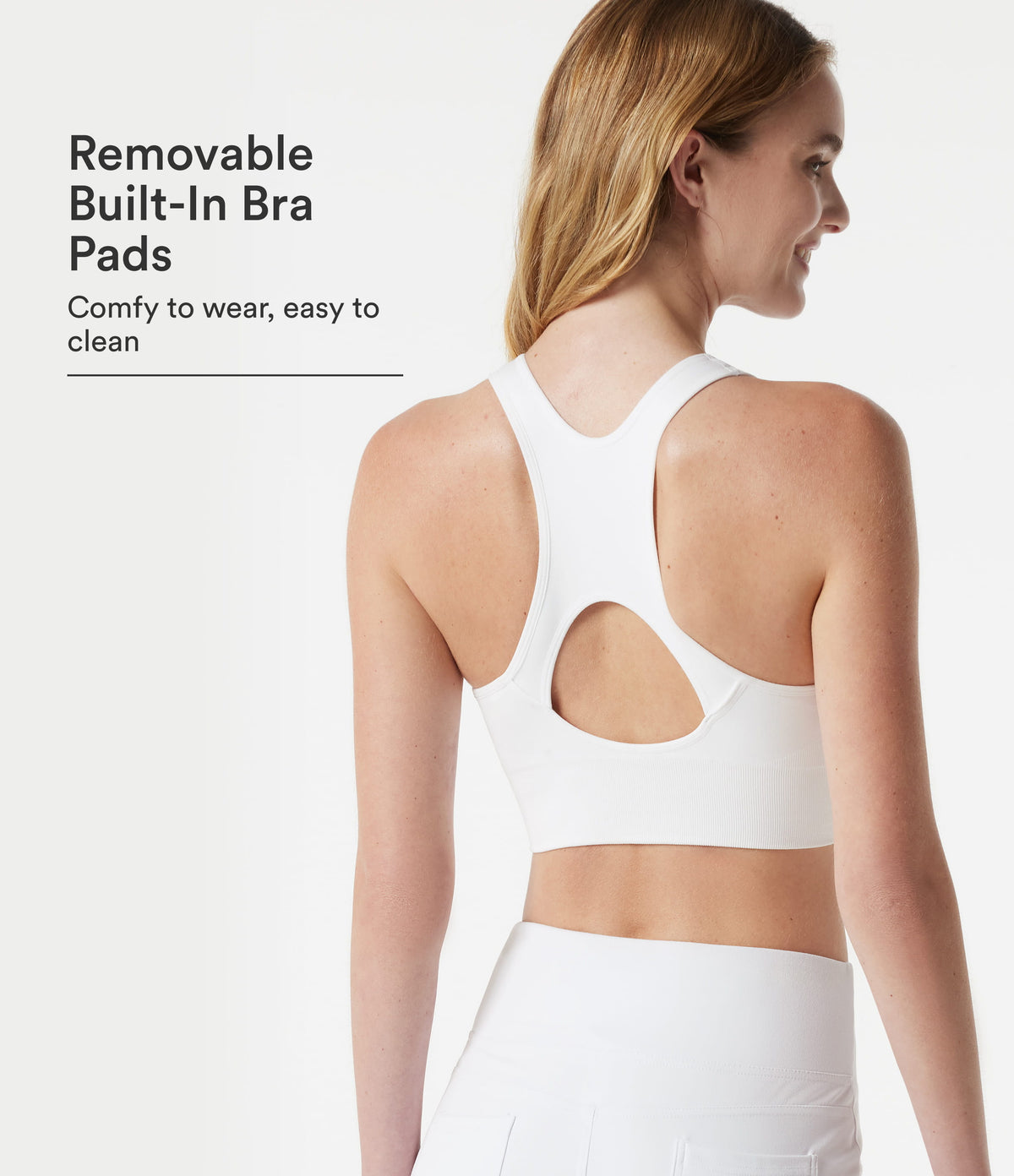 OneForm Seamless Flow Low Support Racerback Zip Fly Built-in Bra Yoga Sports Bra — White — view 1