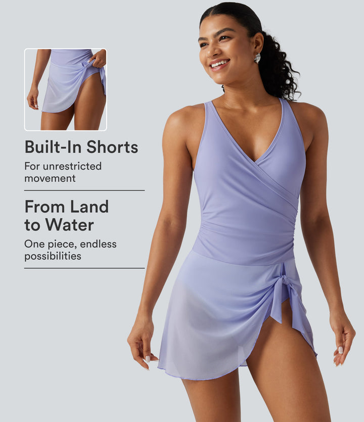 Crossover V Neck Ruched Asymmetric Tie Hem Contrast Mesh 2-in-1 Built-in Bra Tummy Control Swim Dress — Baby Lavender — view 1