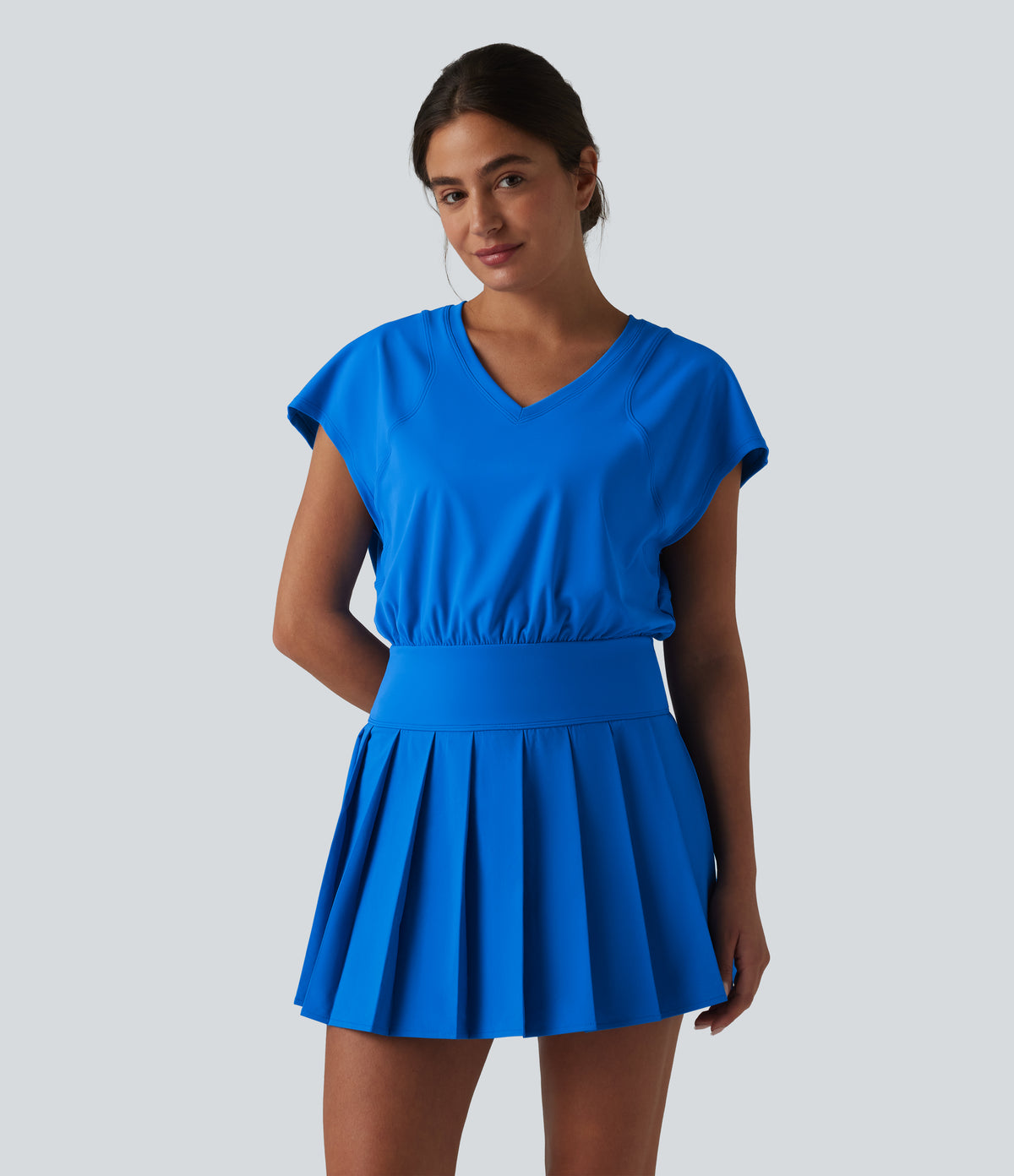 V-neck Invisible Zipper Short Sleeve Pleated Hem 2-in-1 Mini Tennis Active Dress with Pockets — Pure Tile Blue — view 3