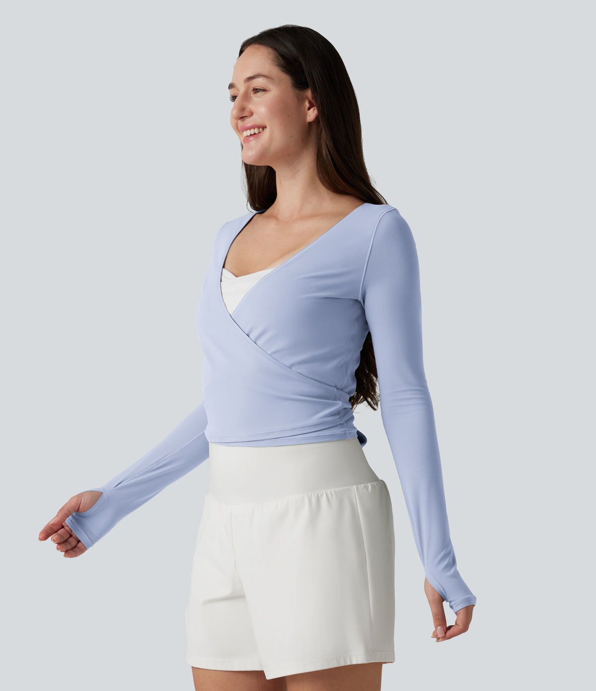 Long Sleeve Thumb Holes Crossover Wrap Tie Casual Top — Xenon Blue — view 4