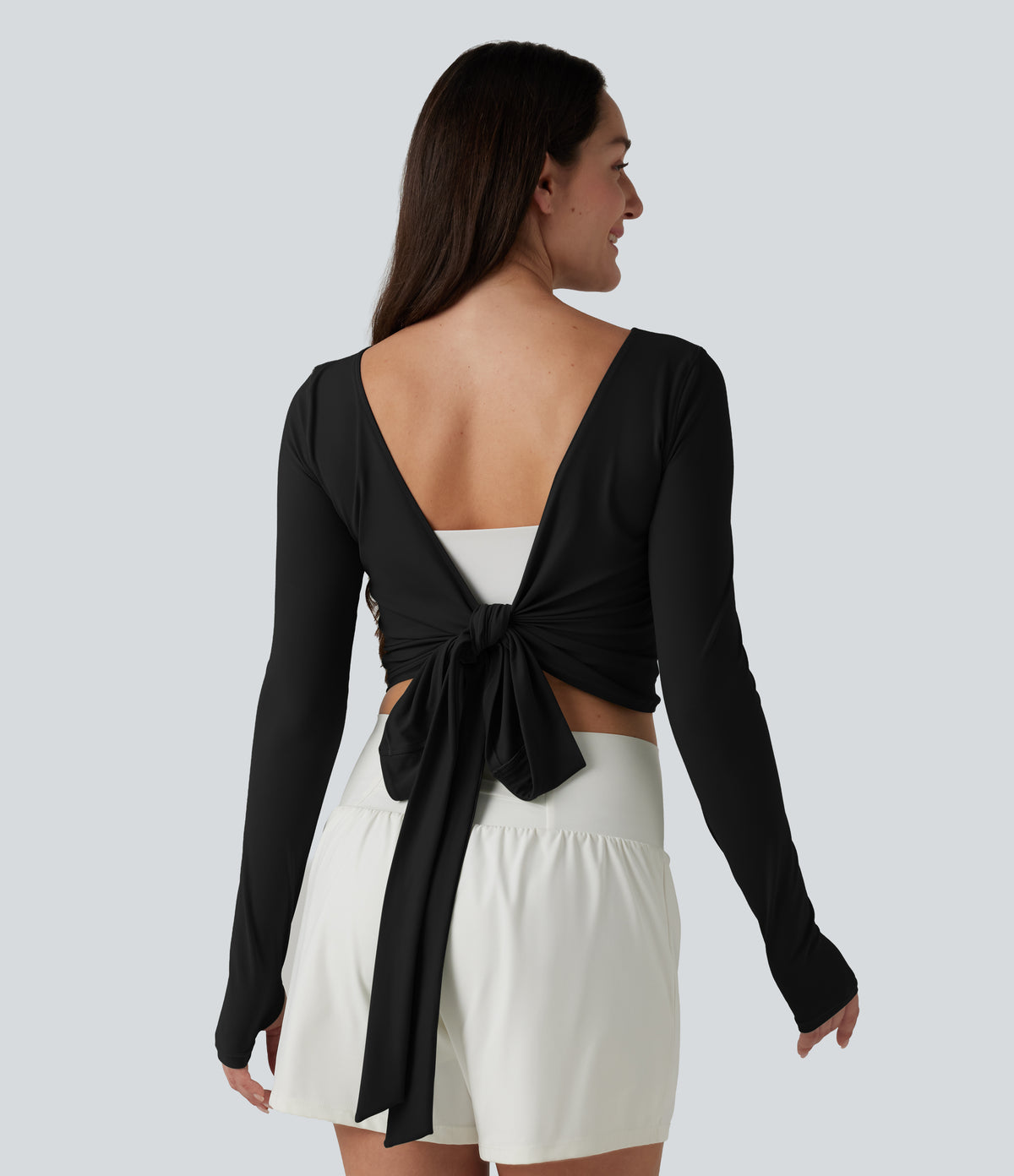 Long Sleeve Thumb Holes Crossover Wrap Tie Casual Top — Black — view 9