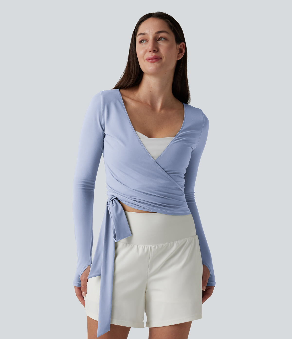 Long Sleeve Thumb Holes Crossover Wrap Tie Casual Top — Xenon Blue — view 5