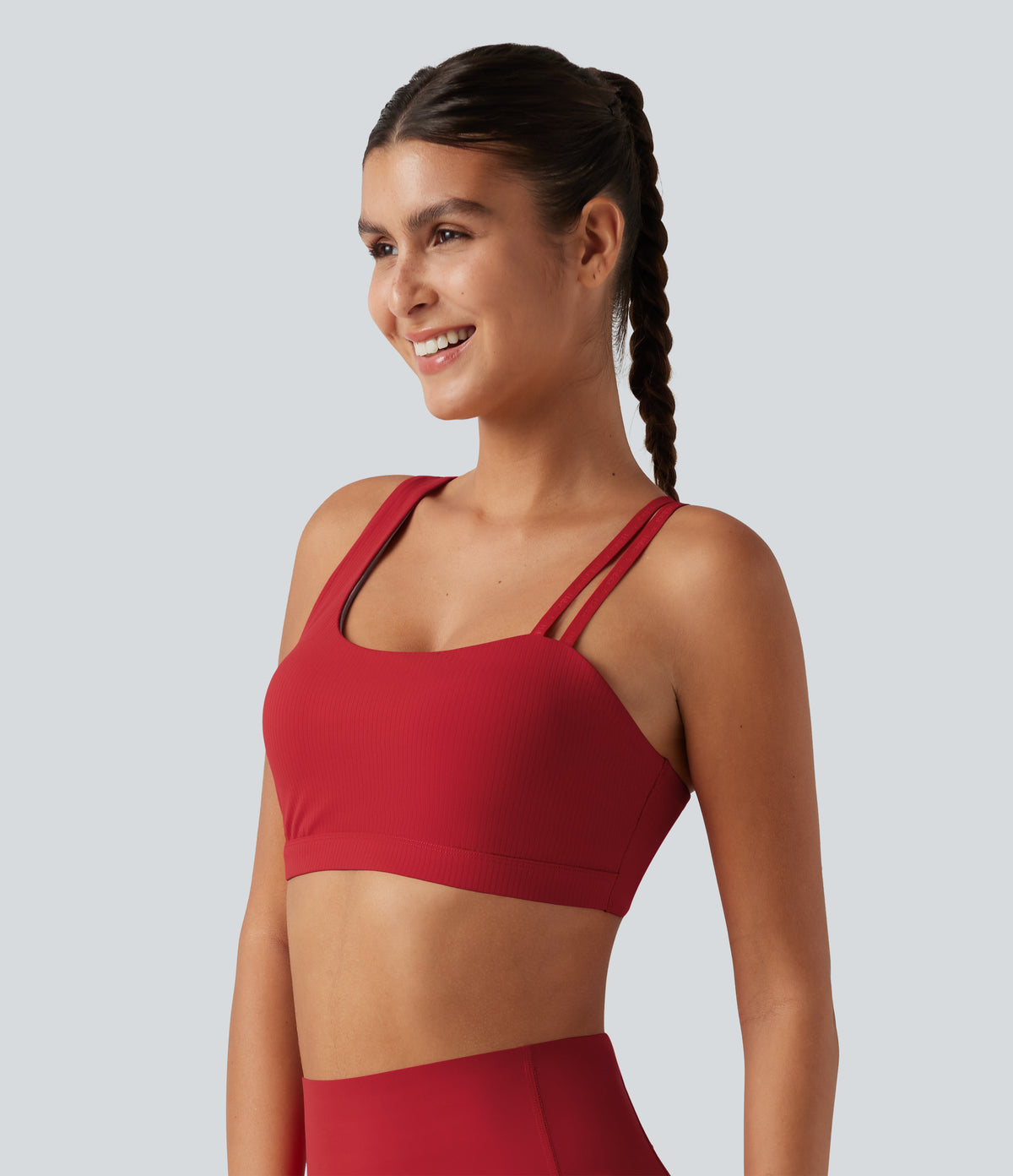 Ribbed Low Support Asymmetric Cut Out Built-in Bra Running Sports Bra — Salsa — view 3