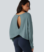 Round Neck Batwing Long Sleeve Curved Hem Cut Out Back Lounging Top — Tourmaline — view 1