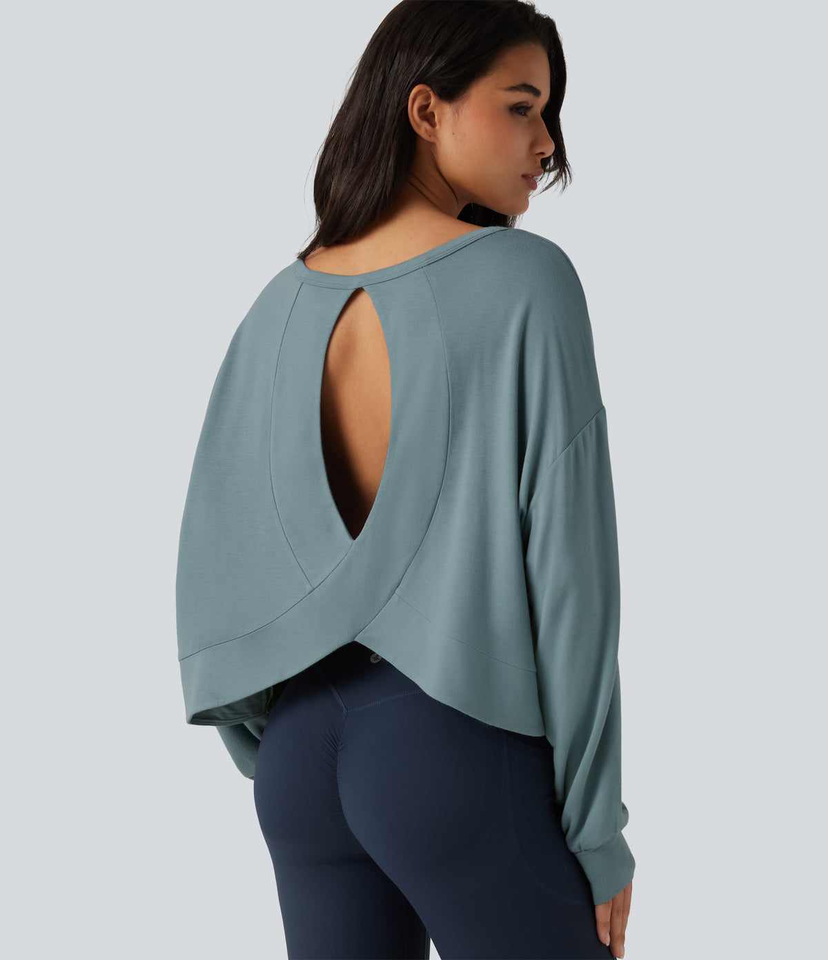Round Neck Batwing Long Sleeve Curved Hem Cut Out Back Lounging Top — Tourmaline — view 1