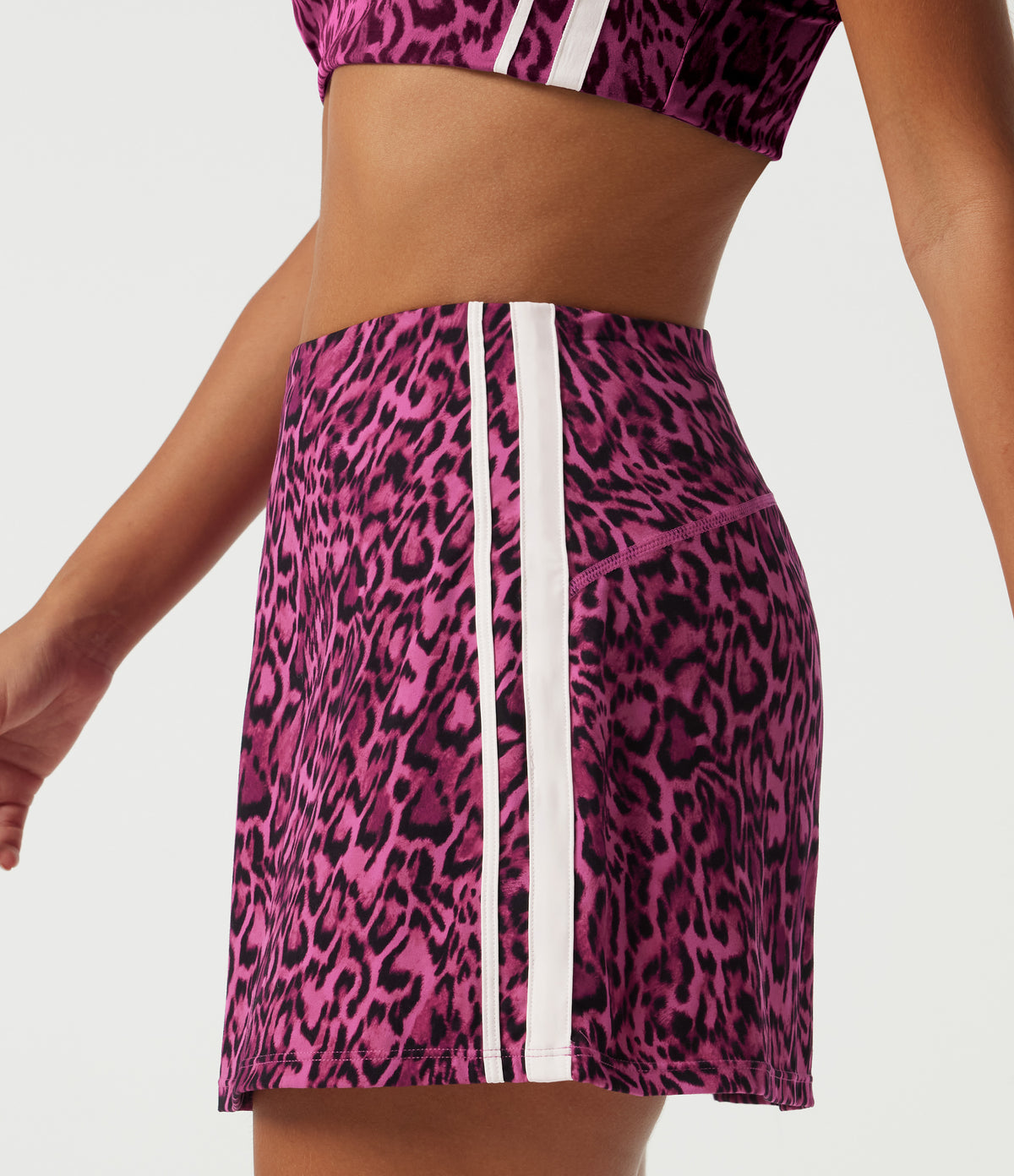 High Waisted Tummy Control A-Line Side Stripe Leopard Print Workout Mini Skirt with Built-in Shorts and Pockets — Black and Fuchsia Leopard Print — view 5