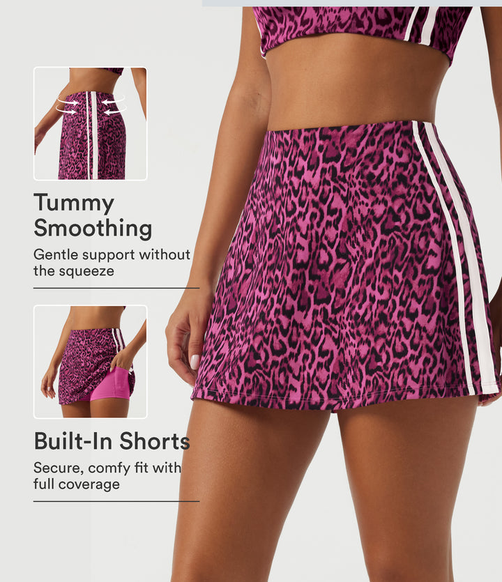 High Waisted Tummy Control A-Line Side Stripe Leopard Print Workout Mini Skirt with Built-in Shorts and Pockets — Black and Fuchsia Leopard Print — view 1