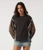 Round Neck Drop Shoulder Long Sleeve Split Hem Leopard Print Casual Top — After Dark — view 1